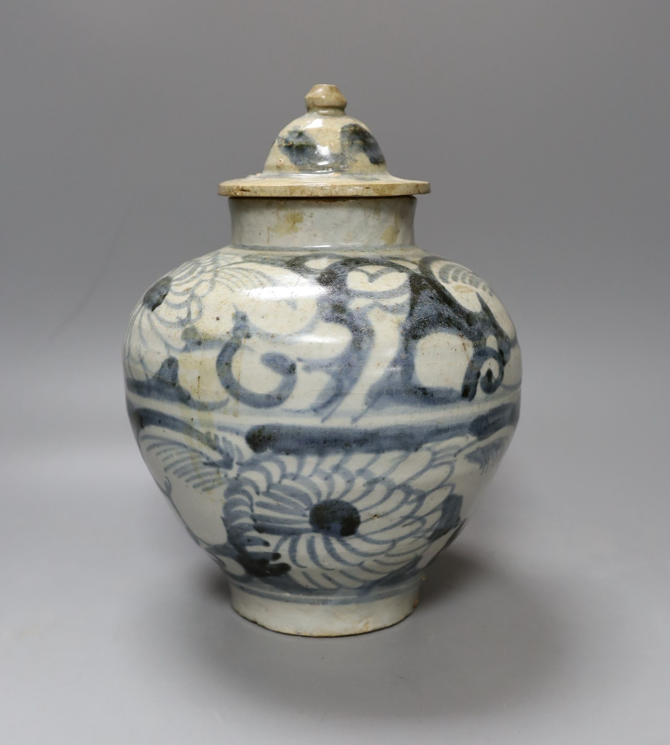 A South East Asian blue and white porcelain jar and cover, possibly Sawankhalok 26cm